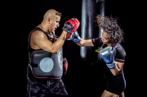 kickboxing, martial arts, combat sports, fitness, training, techniques, history, benefits, beginners. Kickboxing, Martial Arts, Fitness, Self-Defense, Boxing, punches, kicks, knee strikes, elbow strikes, dynamic, action-packed, competitive, weight classes, styles, athletes